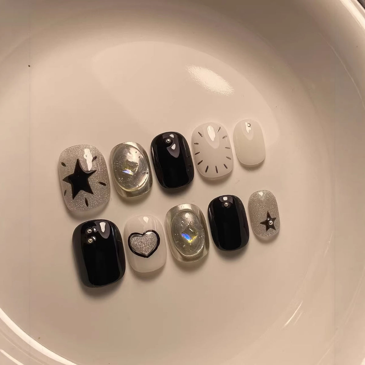 Künstlerisches Press-On-Nagelkunstset mit geometrischen und Sternmustern