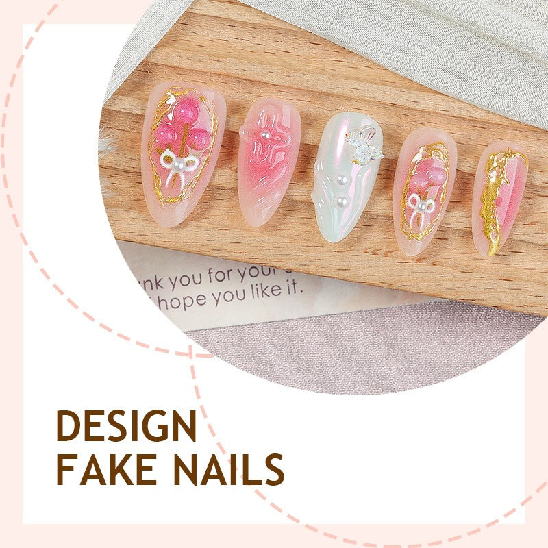 Kunstnagelset mit stilvollen Verzierungen und verspieltem Design Brehn