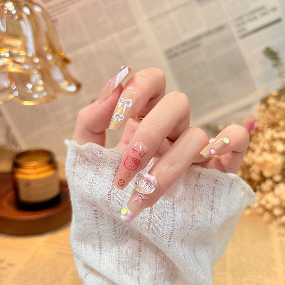 Künstlerisches Press-On-Nagel-Set mit floralen und Edelsteinakzenten Brehn