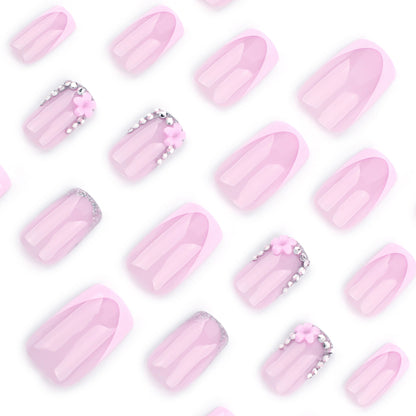 Kunstvolle Gel-Nägel mit eleganten floralem Design und Glitzerakzenten Brehn