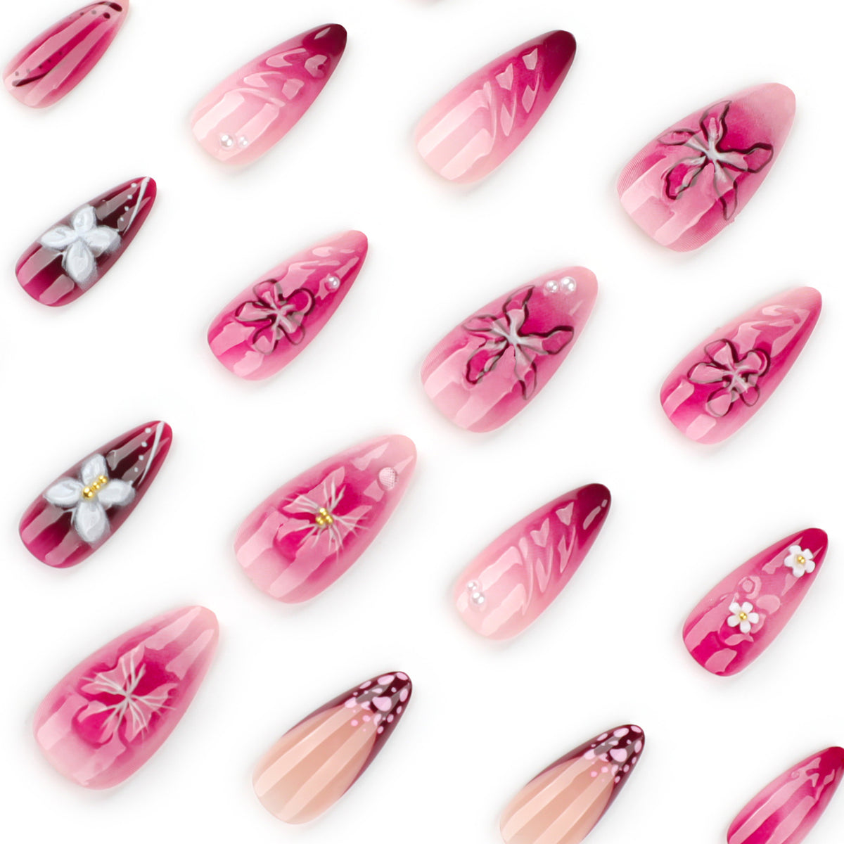 Kunstvolle Nagelverlängerungen mit floralen Details und Ombre-Effekt Brehn
