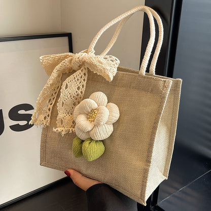 Blumenverzierte Tasche