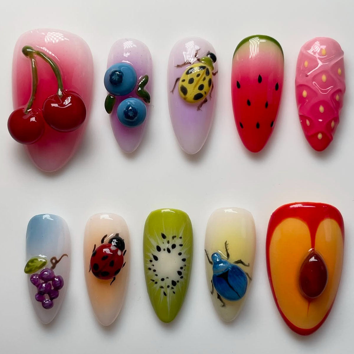 Kreative Obst- und Insekten-Themen Presse-auf-Nagelkunst Brehn