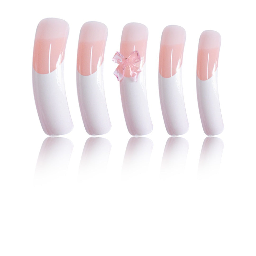 Stylische Acryl Press-On Nagelverlängerungen mit dekorativem Bogen Brehn