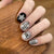 Glamouröse Kunstnägel mit Strass- und Glitzermotiven Brehn
