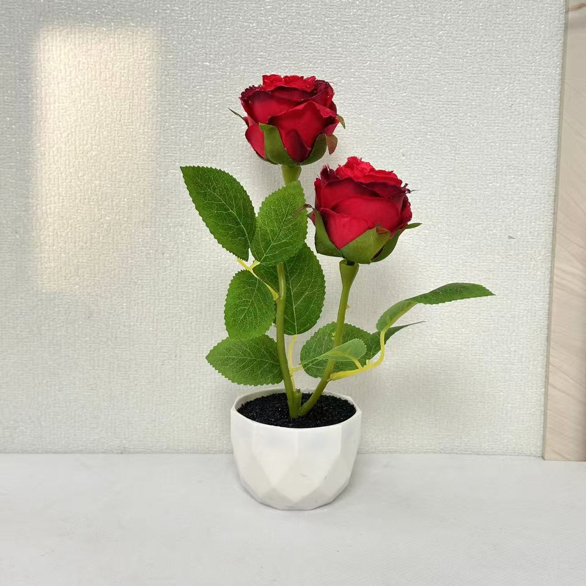 Dekoratives Künstliches Rosengewächs Arrangement für die Wohnkultur
