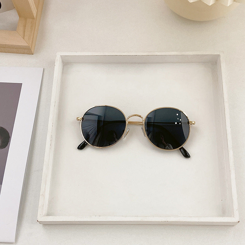Modische Runde Sonnenbrille mit Goldener Fassung Brehn