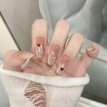 Elegantes Press-On-Nageldesign mit Strassakzenten Brehn