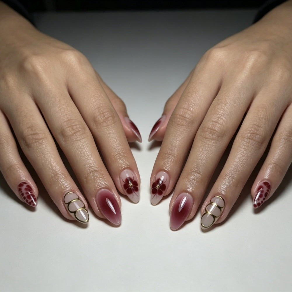 Künstlerisches Press-On-Nagelset mit floralen und Ombre-Designs Brehn