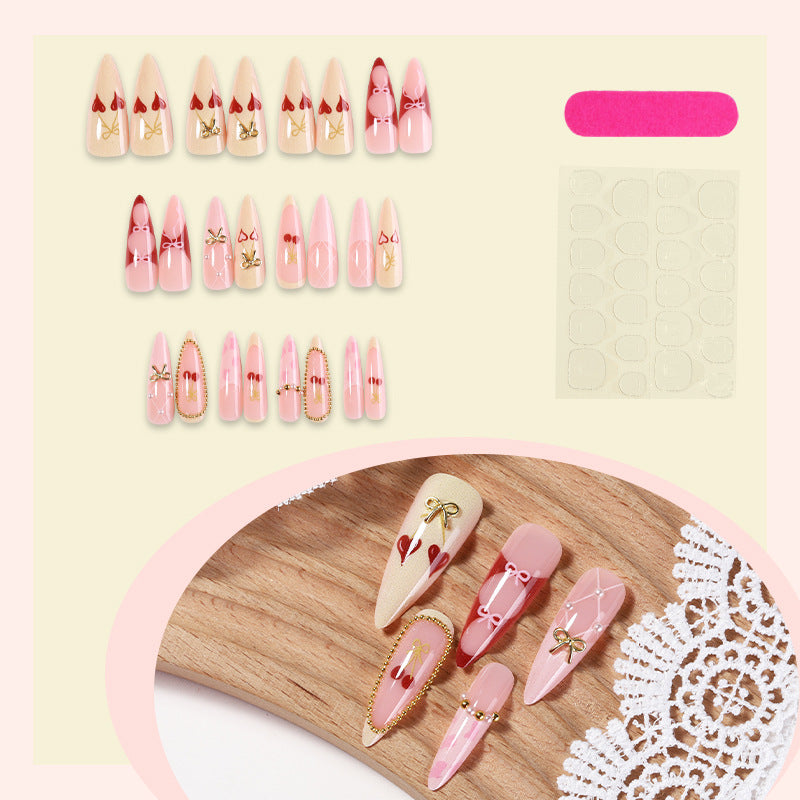 Elegantes dekoratives Press-On-Nagelset mit Schleifen- und Herzdesigns Brehn