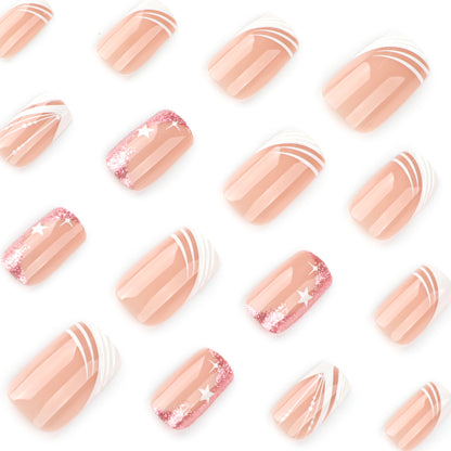 Kunstvolle Nagelverlängerungen mit Glitzer- und Sternendesign Brehn