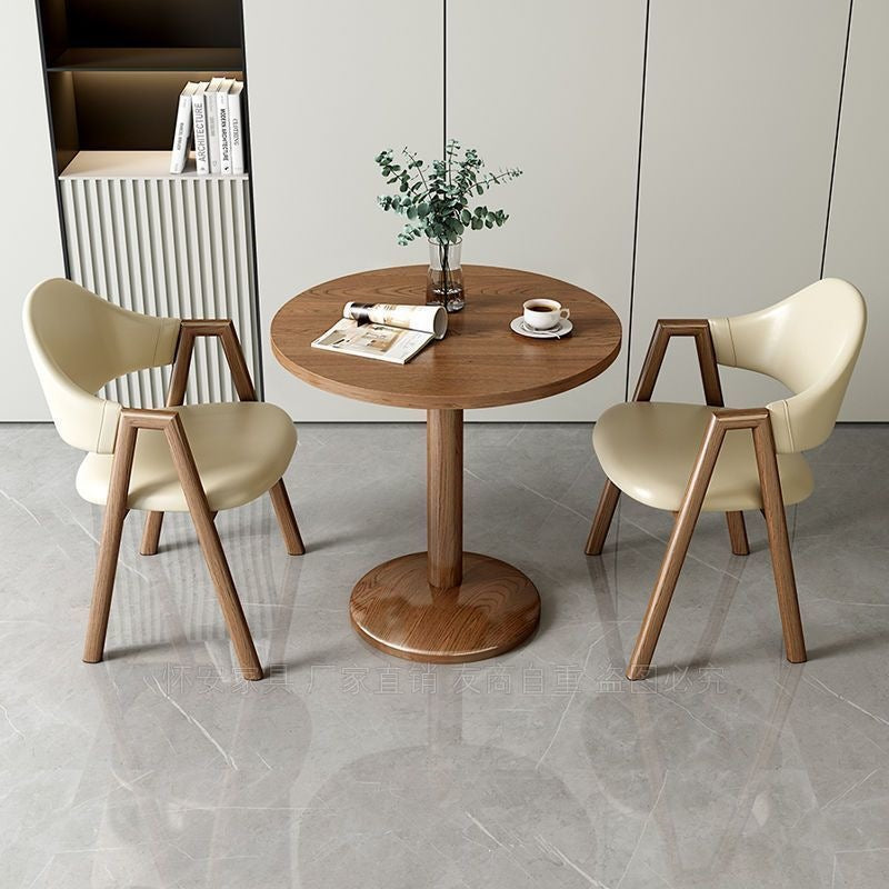 Designertisch mit Marmorplatte und stabiler Metallbasis Brehn