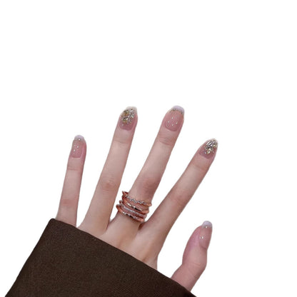 Dekoratives Press-On Nagelkunstset mit eleganten Designelementen