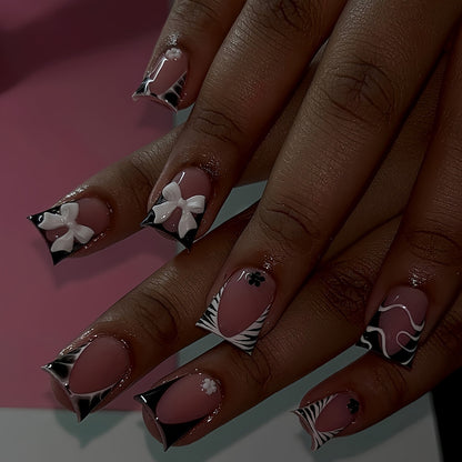 Dekorative Press-On Nagelkunst mit floralen und grafischen Designs Brehn
