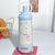 Damen stilvolle Trinkflasche mit elegantem Schleifenmotiv Brehn