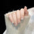 Florales Kunst Press-On Nagelset mit Perlen Brehn