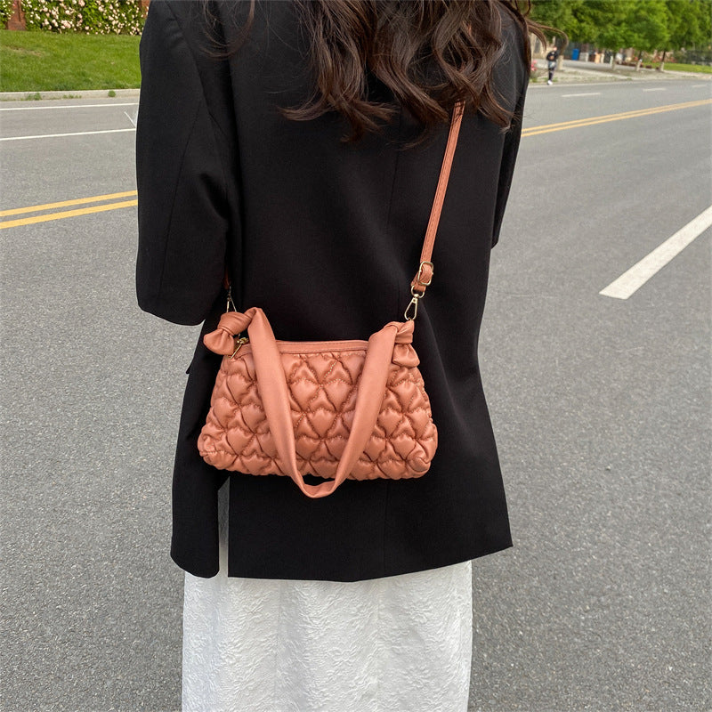 Elegante gepuffte Handtasche