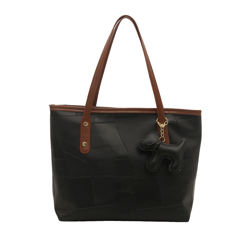 Stylische strukturierte Tragetasche mit dekorativem Charme