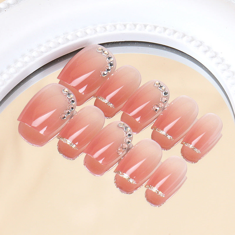 Elegante Ombre Press-On Nagelset mit dekorativen Strassakzenten Brehn