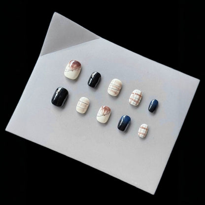 Künstlerisches Press-On Nagelset mit abstraktem Marmor Design