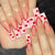 Kreatives Kunstnagelset mit Herzen- und Ombre-Design Brehn