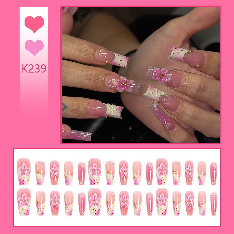 Kunstnagelset mit eleganten Blütenmotiven Brehn