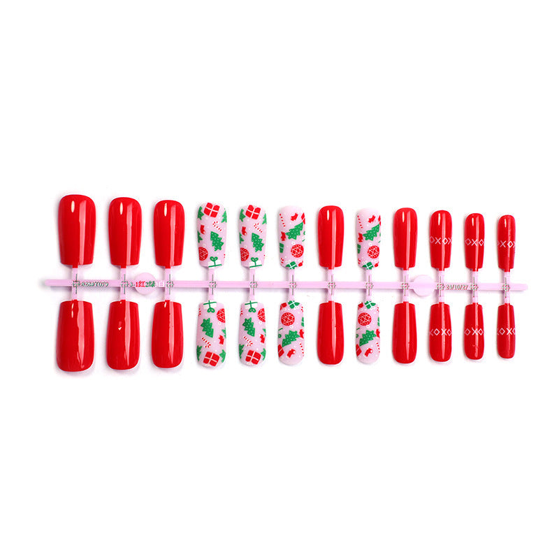 Kunstnagelset mit festlichen Weihnachtsmotiven und glamourösem Glitzer Brehn