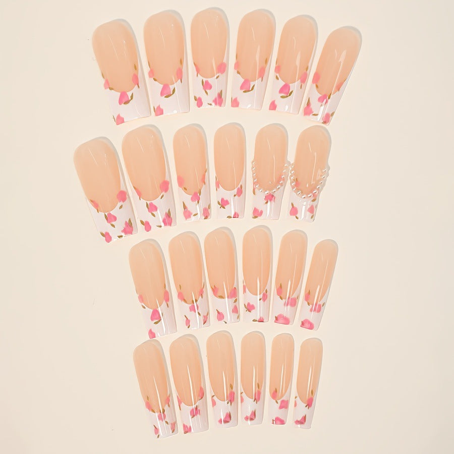 Kunstnagelset mit floralen Designs und eleganten Verzierungen Brehn
