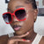 Damen modische Sonnenbrille mit goldenen Kettendetails Brehn