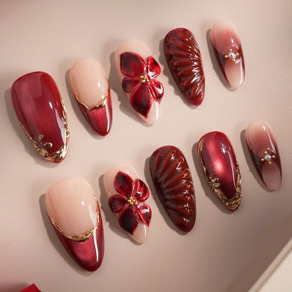 Kunstnagelset mit floralem Design und eleganten Glitzerdetails Brehn