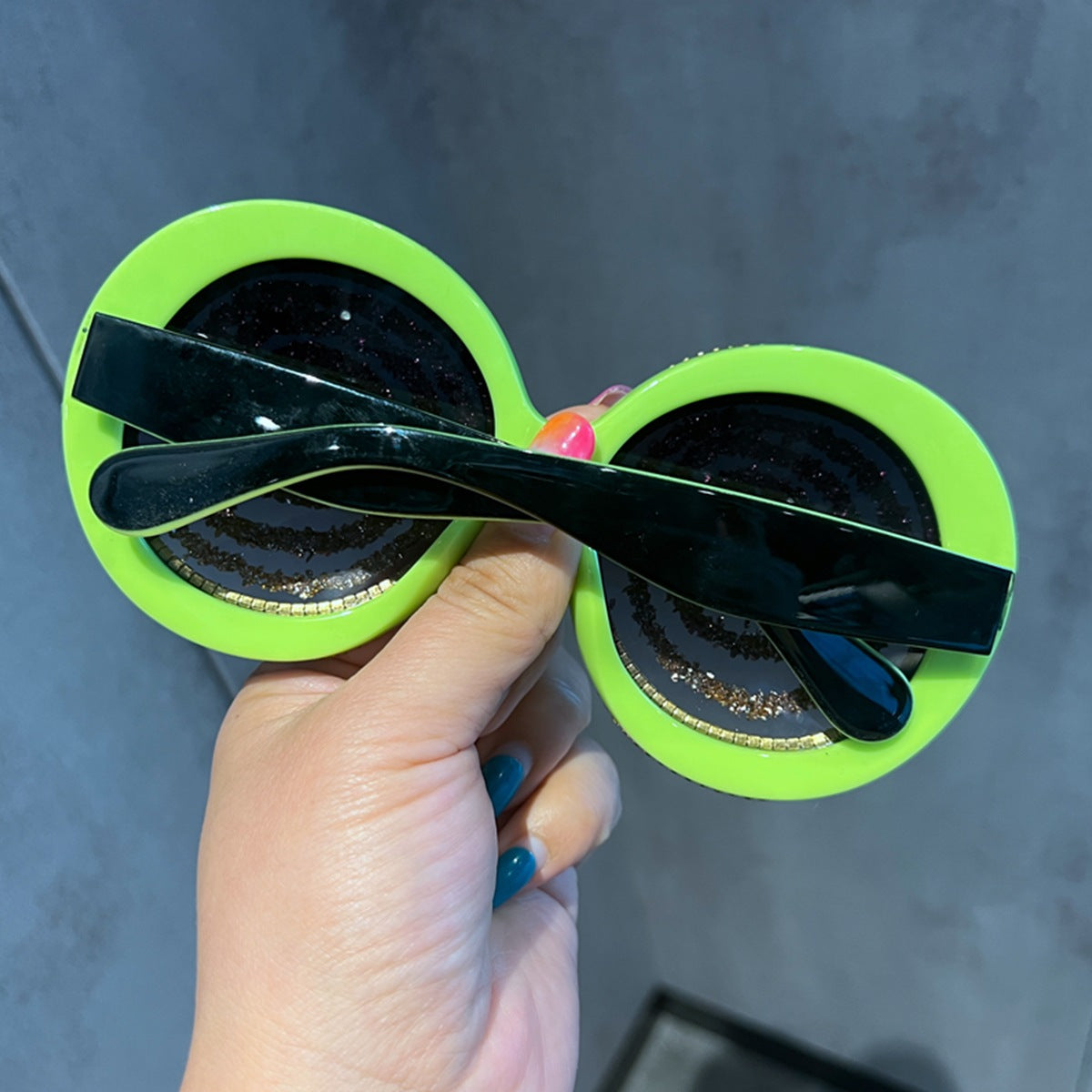 Damen Statement-Sonnenbrille mit spiralförmigem Glitzerdesign Brehn