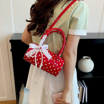 Elegante Perlenakzent-Handtasche