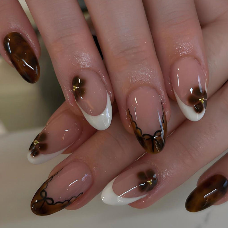 Kunstnagelset mit elegantem Flecken-Design Brehn