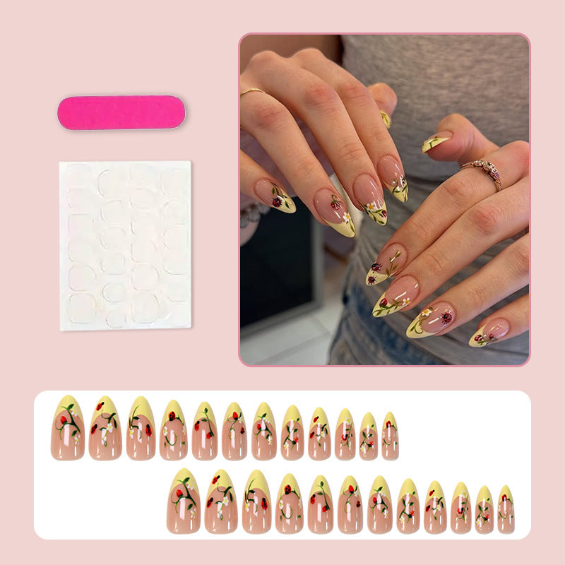 Kunstnagelset mit elegantem Farbverlauf und floralen Akzenten Brehn