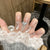 Kunstnagelset mit edlen Spitzen und Kristallakzenten Brehn