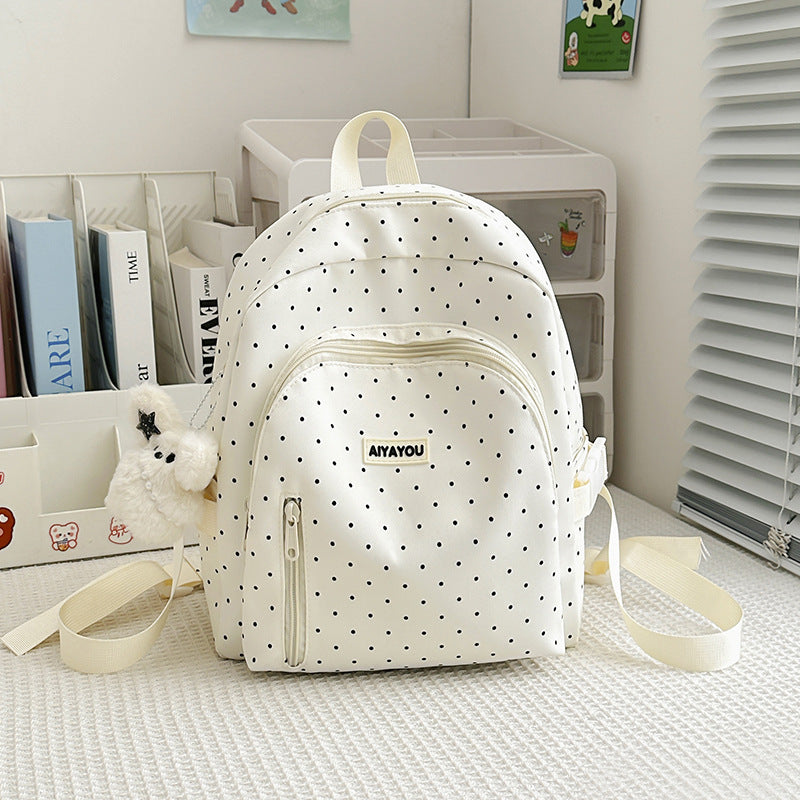 Charmanter gepunkteter Rucksack
