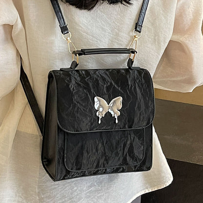 Schmetterlingsverzierte Handtasche