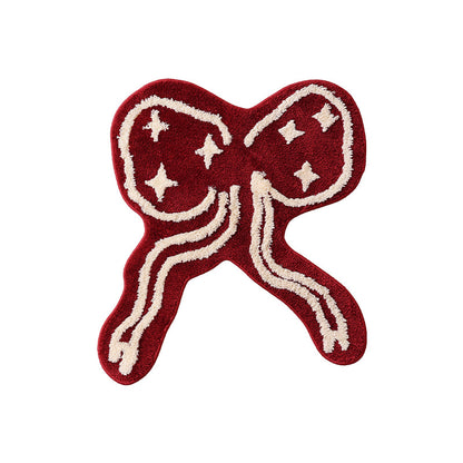Geformter getufteter Zierteppich mit Schleifen- und Sternmotiv Brehn