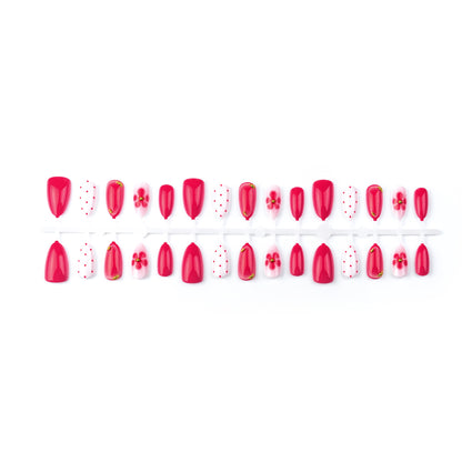 Künstlerisches Press-On-Nagelset mit Blumen- und Punktdesigns