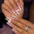 Elegante und kunstvolle Nagelkunst mit Strass-Details Brehn