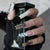 Künstlerisches Langes Stiletto Press-On Nagelset mit einzigartigen Mustern Brehn
