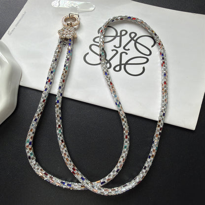 Dekorativer, mit Kristallperlen verzierter Brillenband Brehn