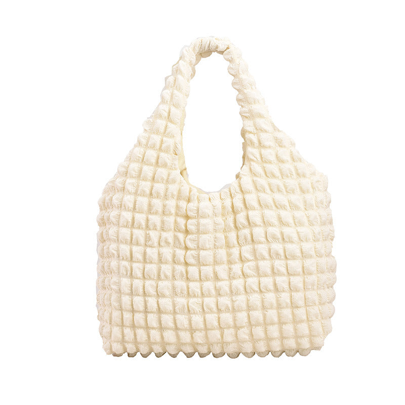 Gemütliche strukturierte Schultertasche