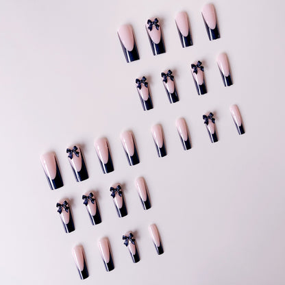 Elegante Kunstnagelspitzen mit Schleifenverzierungen Brehn