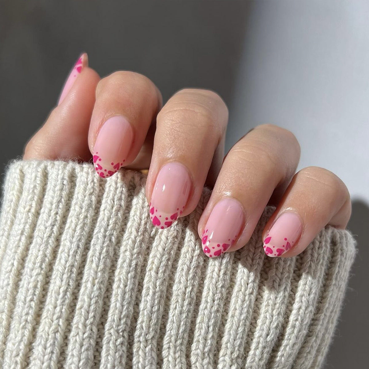 Künstliche Nagelverlängerungen mit Herzspitzen Akzenten Brehn