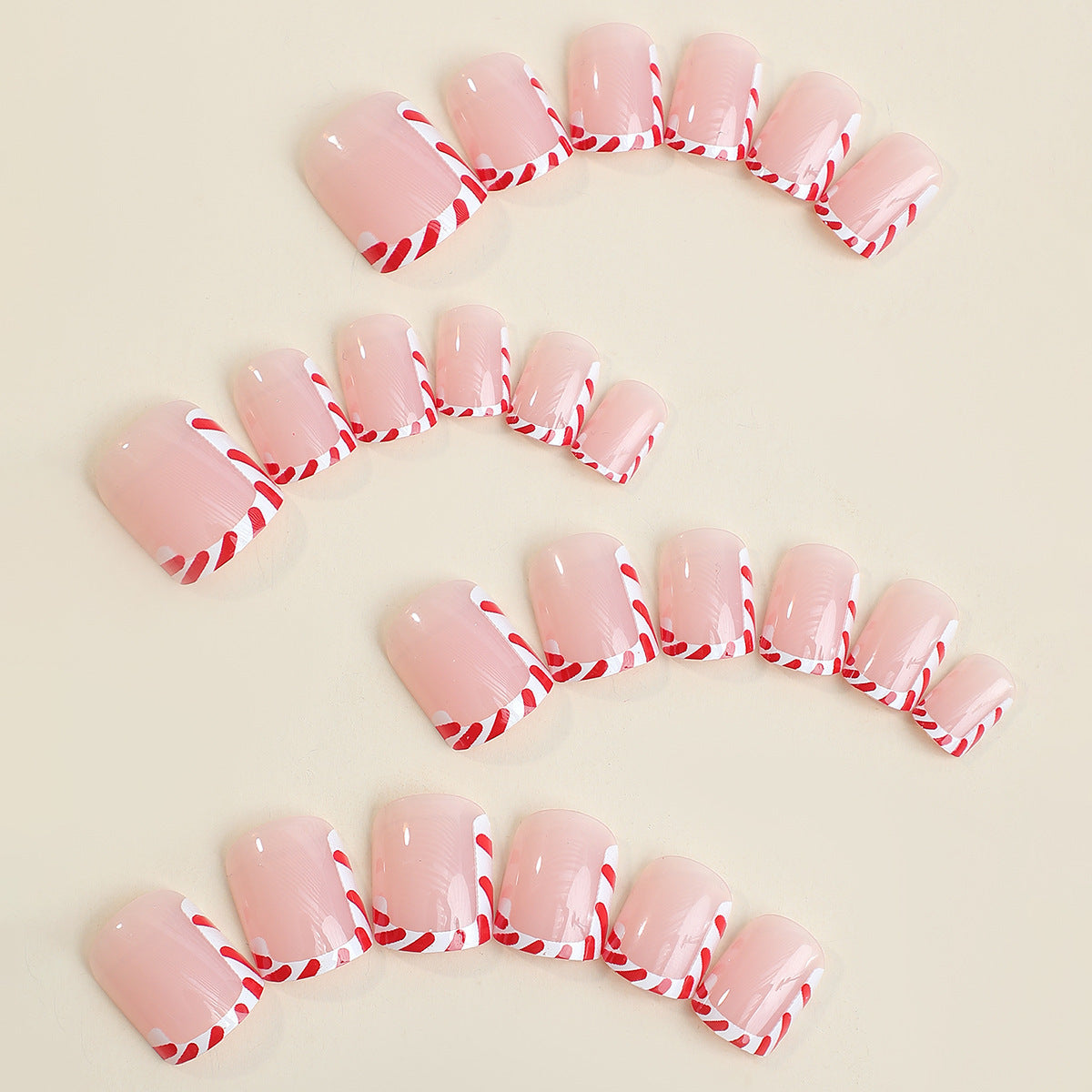 Kreatives Kunstnagelset mit festlichem Zuckerstangen-Design Brehn