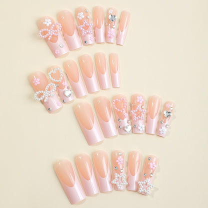 Glamouröses Kunstnagelset mit 3D-Schleifen und Glitzersteinen Brehn