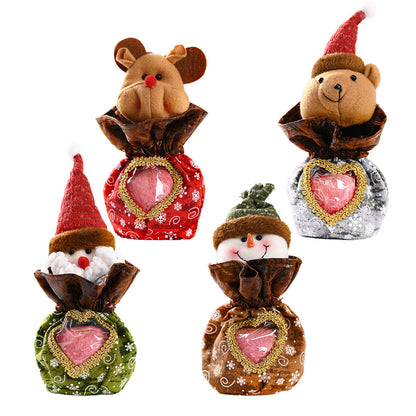 Niedliche Weihnachtsfigur mit Herzbeutel Brehn