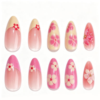Kunstnagelset mit floralen Akzenten und Glitzerelementen Brehn