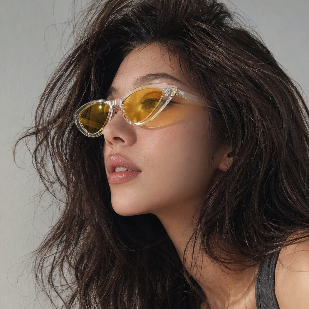 Damen Cat-Eye Sonnenbrille mit transparenter Rahmenkonstruktion und gelben Gläsern Brehn